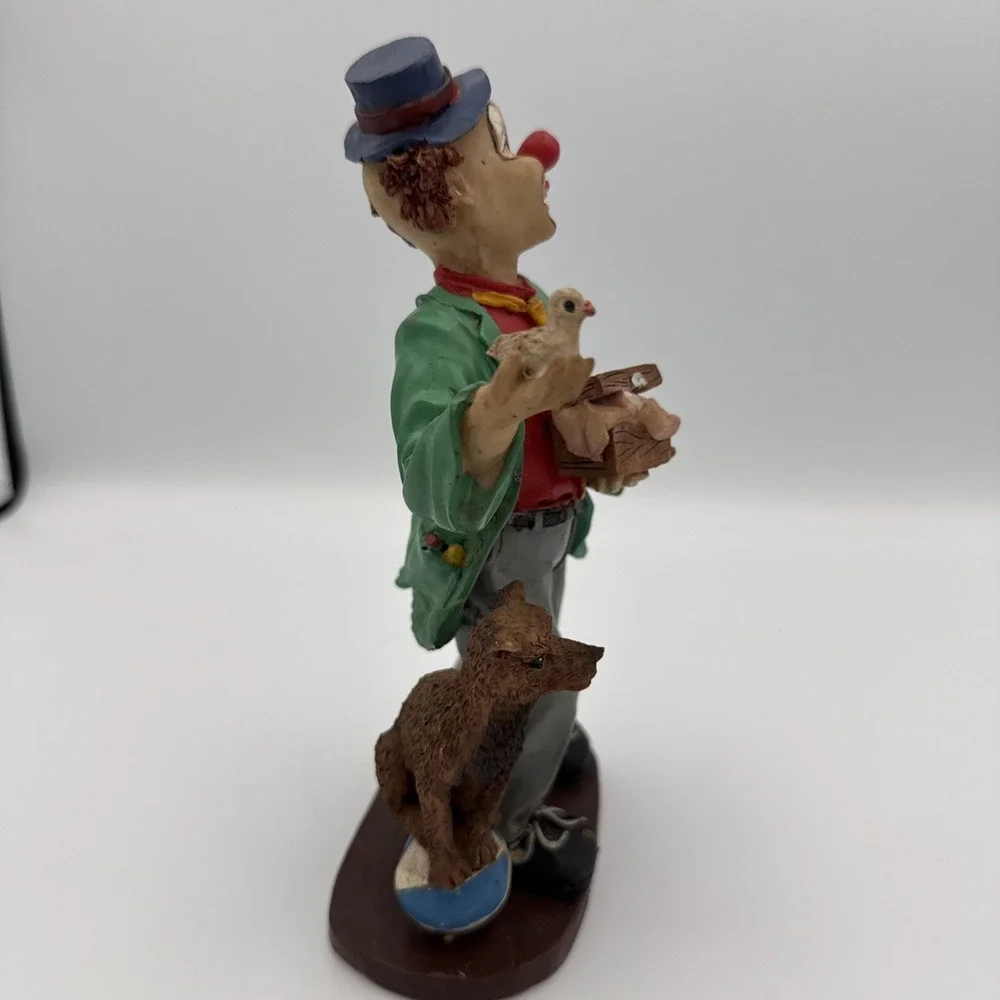 Vintage Clown Figurine With Bird In Hand And Dog Standing On A Ball